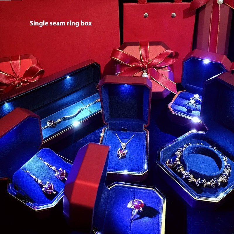 High-end LED gift box jewelry packaging set with illuminated necklace, ring, and wristwatch boxes in elegant white and blue design. Ideal for birthday gifts, proposals, or luxury jewelry presentation.