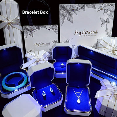 High-end LED gift box jewelry packaging set with illuminated necklace, ring, and wristwatch boxes in elegant white and blue design. Ideal for birthday gifts, proposals, or luxury jewelry presentation.