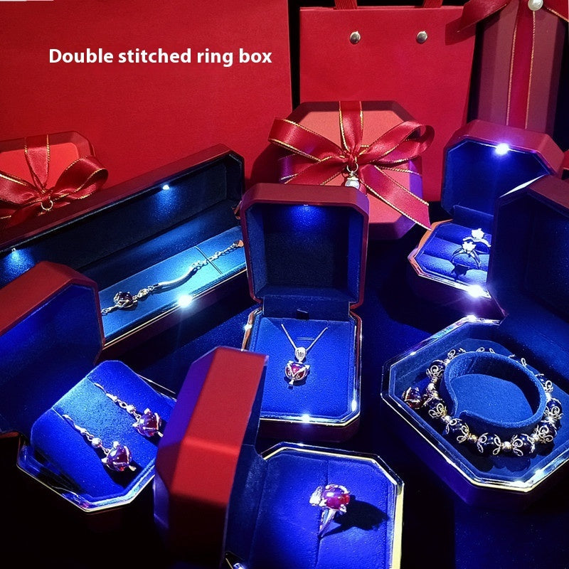 High-end LED gift box jewelry packaging set with illuminated necklace, ring, and wristwatch boxes in elegant white and blue design. Ideal for birthday gifts, proposals, or luxury jewelry presentation.