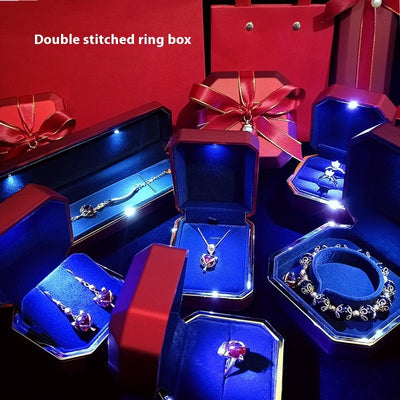 High-end LED gift box jewelry packaging set with illuminated necklace, ring, and wristwatch boxes in elegant white and blue design. Ideal for birthday gifts, proposals, or luxury jewelry presentation.