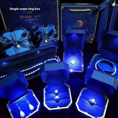 High-end LED gift box jewelry packaging set with illuminated necklace, ring, and wristwatch boxes in elegant white and blue design. Ideal for birthday gifts, proposals, or luxury jewelry presentation.
